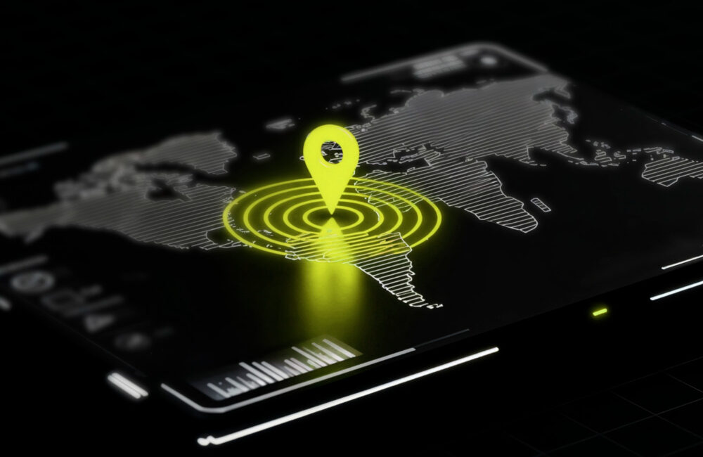 Map with location icon on screen representing real-time monitoring and AML compliance tracking